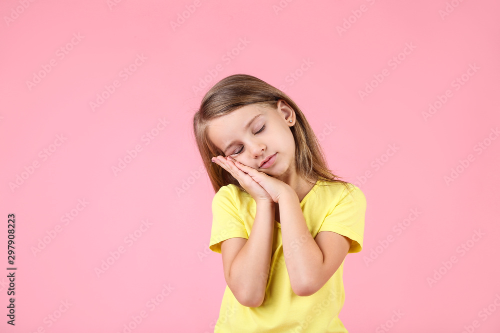 Beautiful little girl on pink background Beautiful little girl on pink background