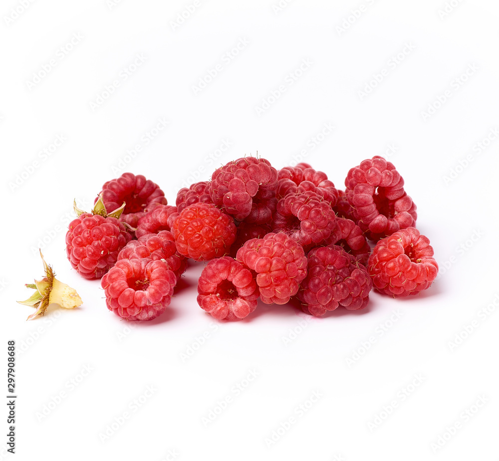 bunch of red ripe raspberries on a white background bunch of red ripe raspberries on a white background