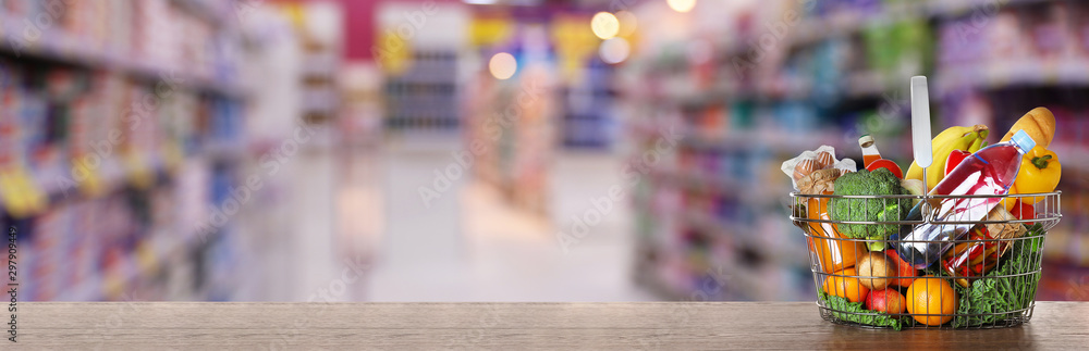 Blurred view of supermarket interior with bokeh effect Blurred view of supermarket interior with bokeh effect