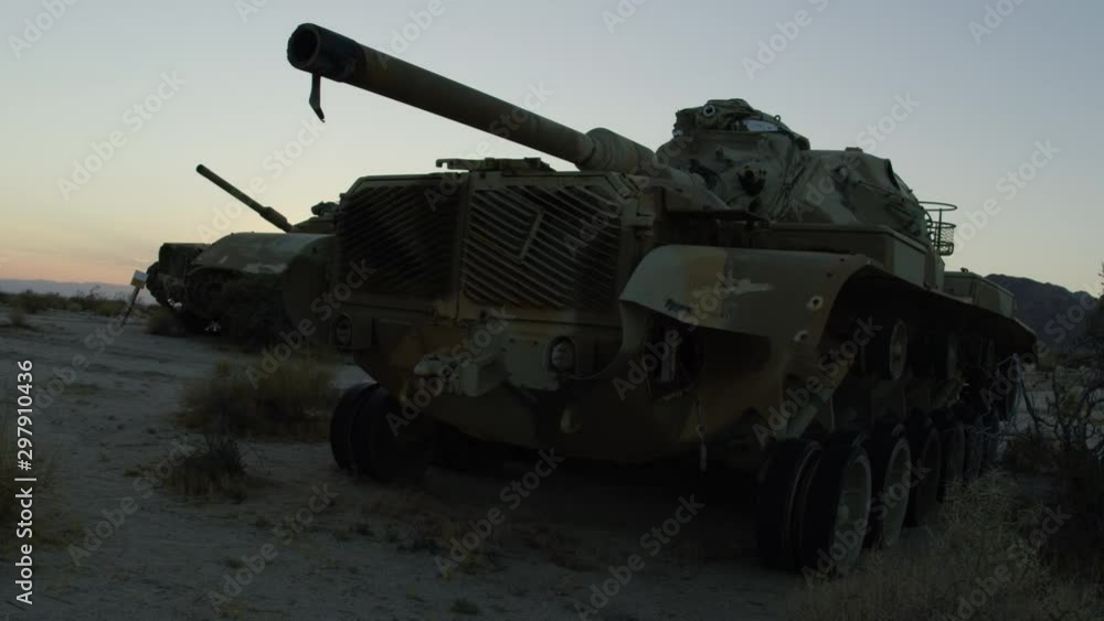 Tracking Around Tank Handheld Slow Motion with Sunset Sky in the Background Tracking Around Tank Handheld Slow Motion with Sunset Sky in the Background