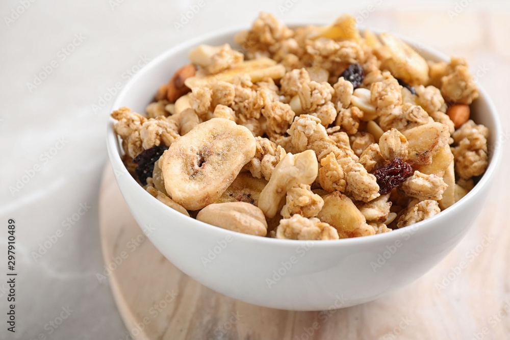 Tasty homemade granola on light table. Healthy breakfast Tasty homemade granola on light table. Healthy breakfast