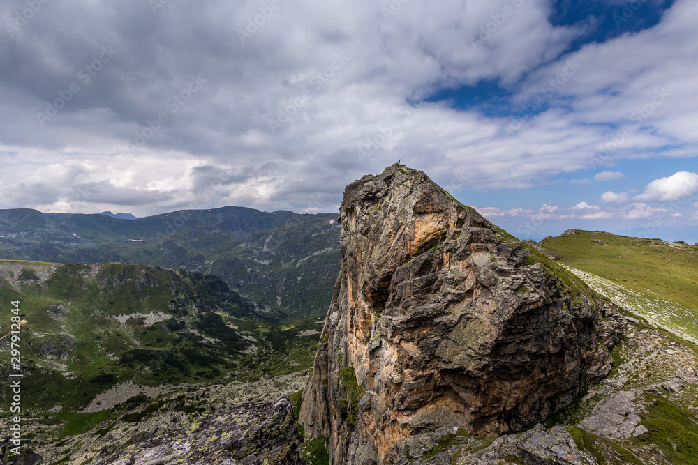 Amazing peak with person on it at Rila mountain i Bulgaria.