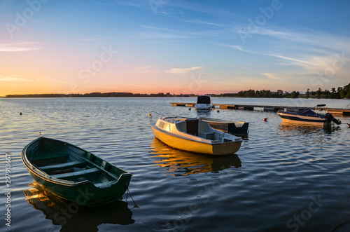 Evening sun over the Kisajno lake and moored boats, Pierkunowo near Gizycko, Masuria, Poland. © Krzysztof Gach