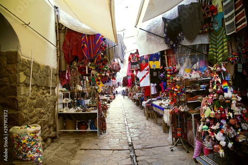 colorful market of Pisac in the Andes of Peru © pattilabelle