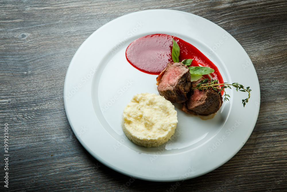 top view on delicious fried meat pieces with potato puree and sauce top view on delicious fried meat pieces with potato puree and sauce