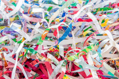 Closeup shredded paper texture and reuse colorful color paper scrap of document .Selective focus image.