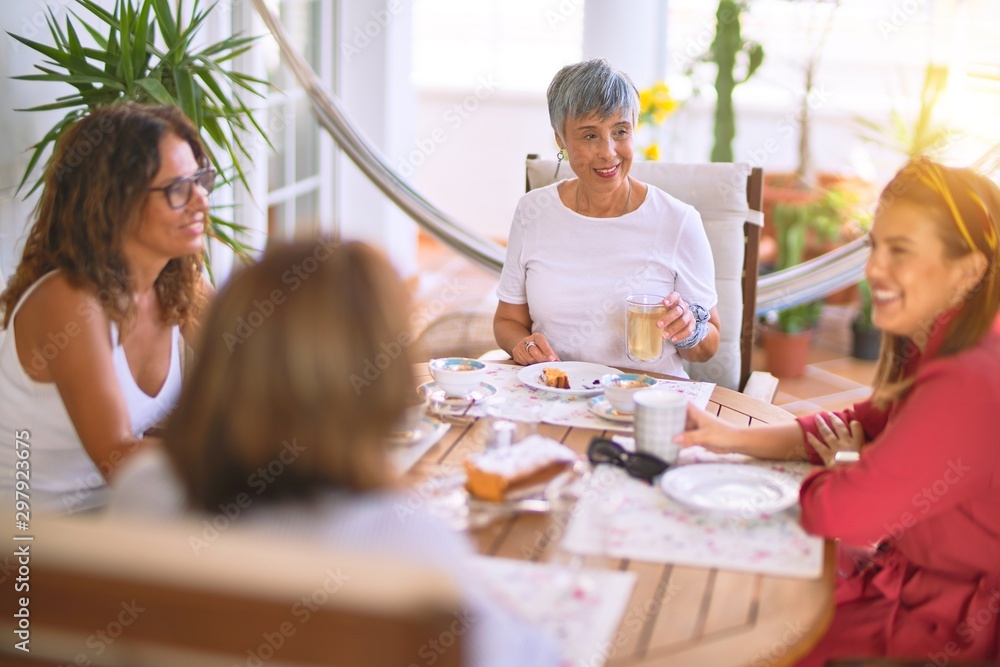 Young beautiful girl smiling happy and confident sitting dinking cup of coffee at terrace