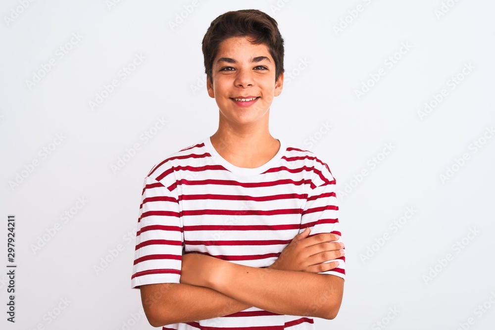 Handsome teenager boy standing over white isolated background happy face smiling with crossed arms looking at the camera. Positive person. Handsome teenager boy standing over white isolated background happy face smiling with crossed arms looking at the camera. Positive person.