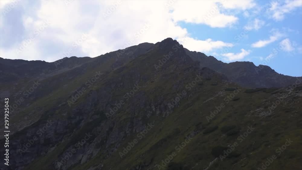 Aerial view of the mountain ridge of Pietrosu Rodnei at Rodnei Mountains National Park, Romania. Arial dolly forward towards the summit Aerial view of the mountain ridge of Pietrosu Rodnei at Rodnei Mountains National Park, Romania. Arial dolly forward towards the summit