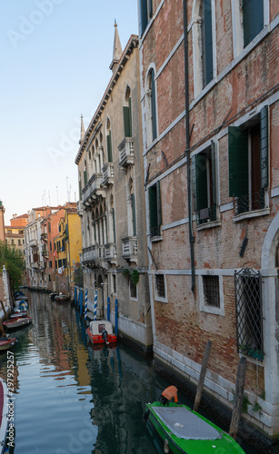 Old buildings in Venice. Canal view with boat. Travel photo. Italy. Europe. © Viktoras