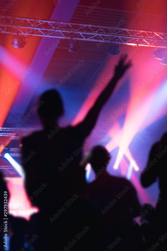 people enjoying a party with many colorful lights