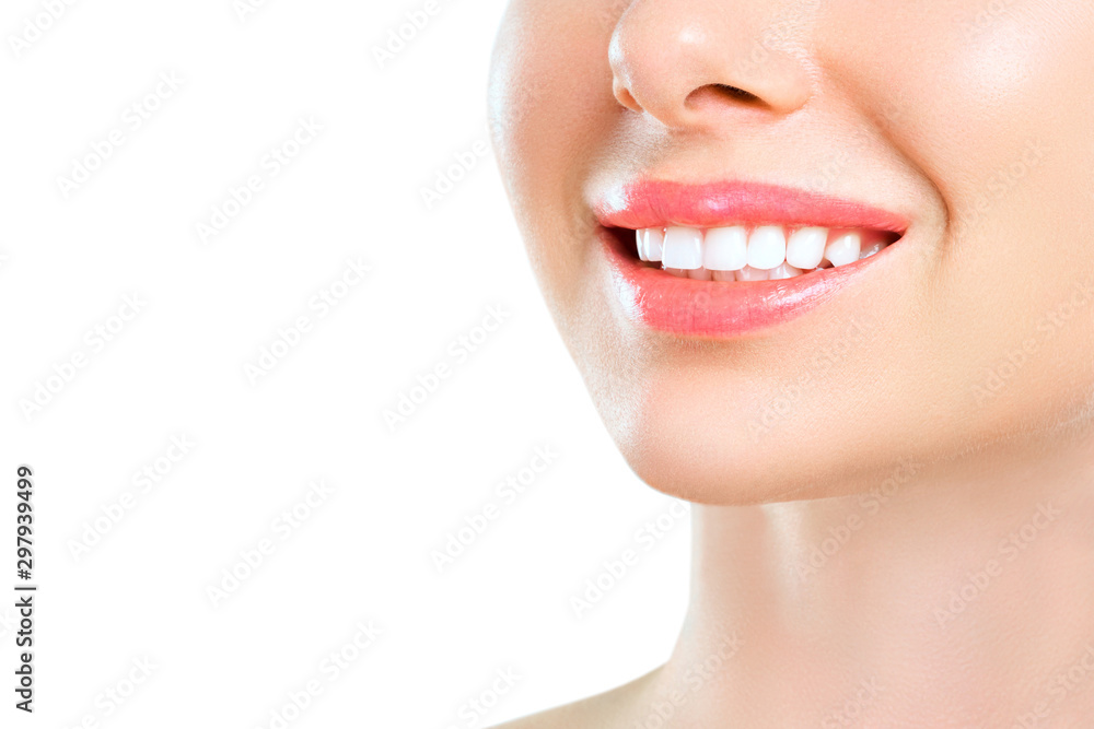 Perfect healthy teeth smile of a young woman. Teeth whitening. Dental clinic patient. Image symbolizes oral care dentistry, stomatology Perfect healthy teeth smile of a young woman. Teeth whitening. Dental clinic patient. Image symbolizes oral care dentistry, stomatology