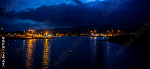 Lights, ships and boats in a Castletownbere harbor at night