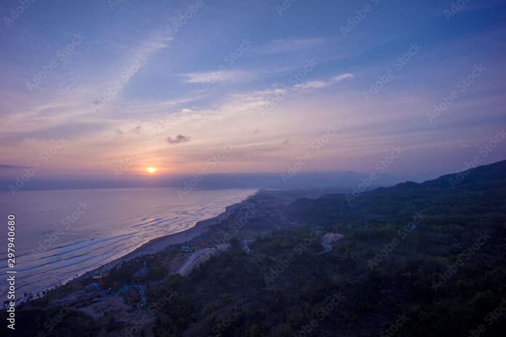 Beautiful sunset from hill, with beach view