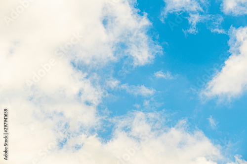 Natural light from the sun with blue sky and white clouds.