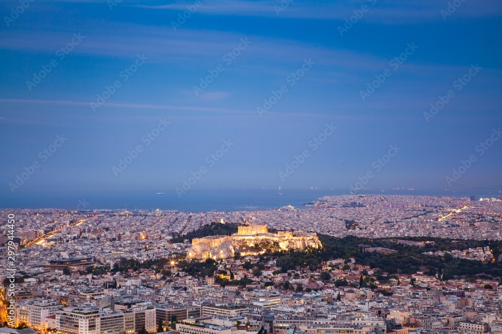 Naklejka premium cityscape of Athens in early morning with the Acropolis seen from Lycabettus Hill, the highest point in the city