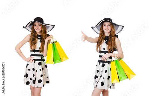 Young woman with shopping bags on white