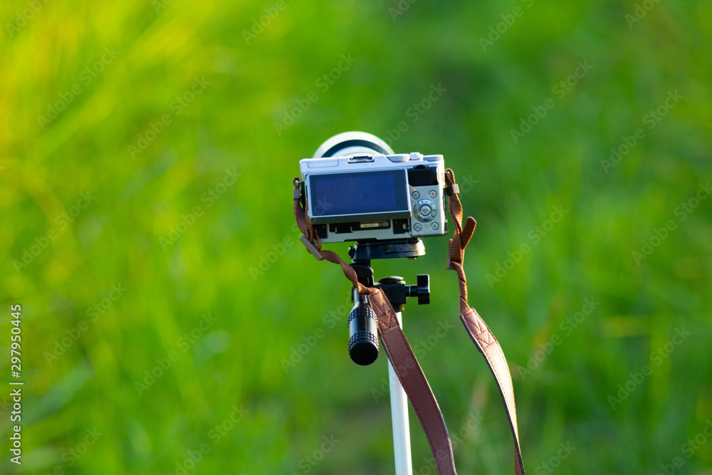 digital camera on tripod