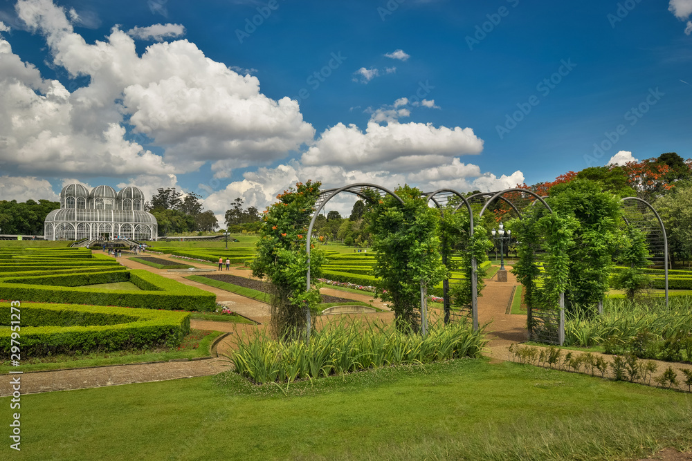 Photograph of the Botanical Garden in Curitiba. Picture taken on a beautiful spring day with several tourists visiting one of the sights of the city.