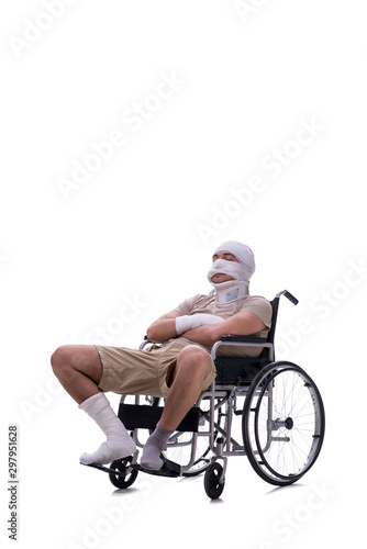 Injured man in wheel-chair isolated on white © Elnur