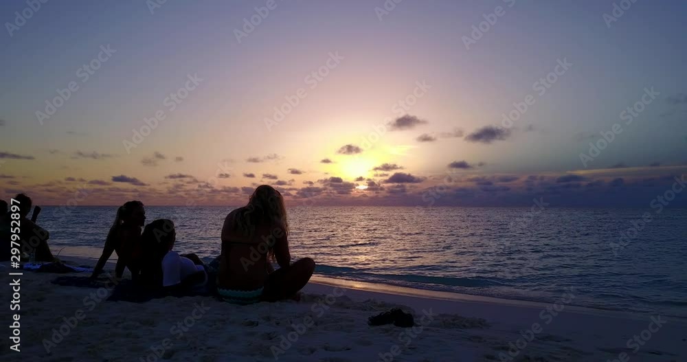 Spending the end of the day with friends on the beautiful beach of Australia Spending the end of the day with friends on the beautiful beach of Australia