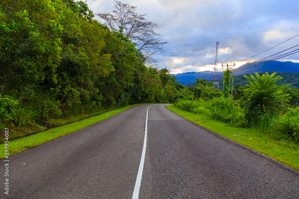 Beautiful Nature landscape with asphalt road on rural, Sabah, Borneo