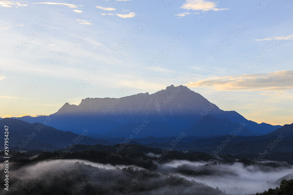 Amazing Beautiful Nature landscape view of Sunrise with  nature misty foggy and Mount Kinabalu, Sabah, Borneo