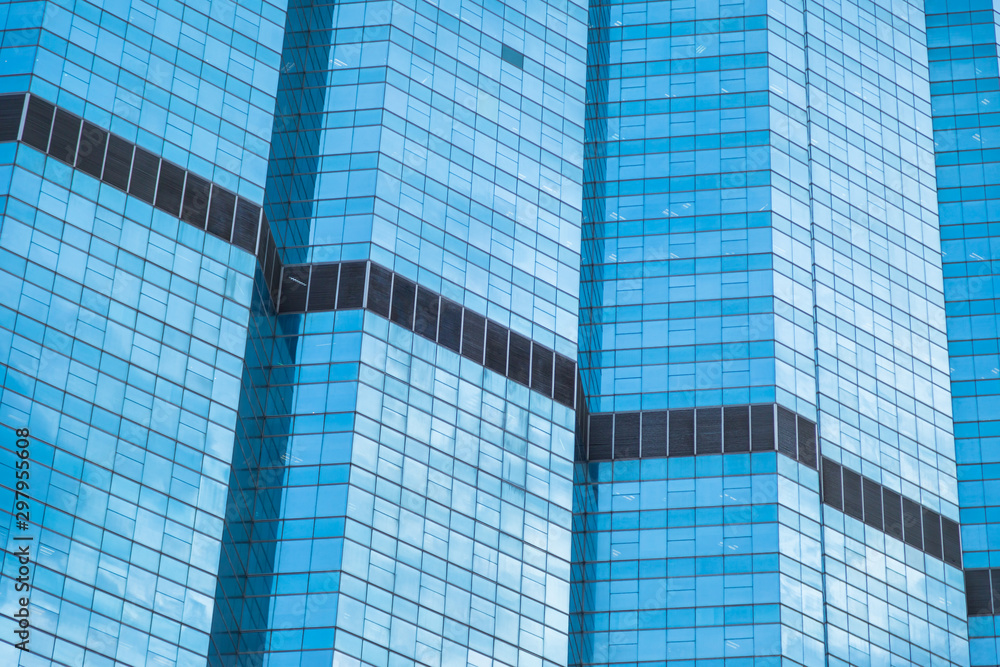 Blue glass windows of modern office building Blue glass windows of modern office building