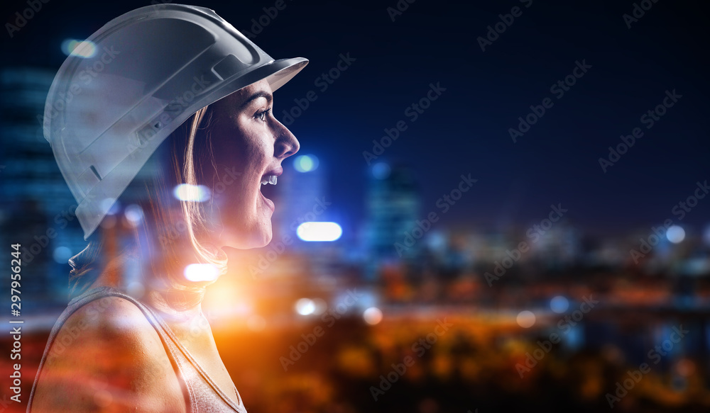 Engineer woman against modern cityscape