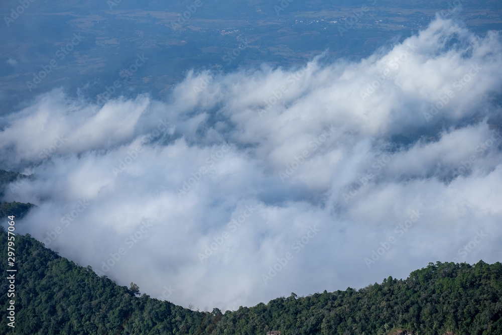 Beautiful light in the morning on mountains in the mist at Chiang Mai Province, Thailand.