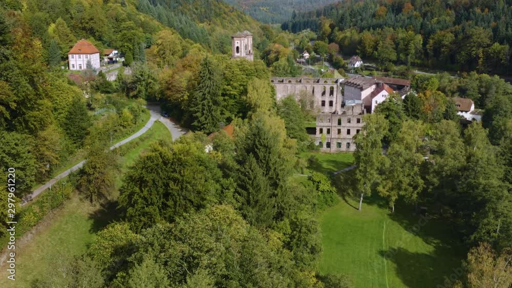 Aerial view of the monastery ruins Frauenalb in Germany on a sunny morning in autumn, fall. Pan to the left and descend beside the monastery. Aerial view of the monastery ruins Frauenalb in Germany on a sunny morning in autumn, fall. Pan to the left and descend beside the monastery.