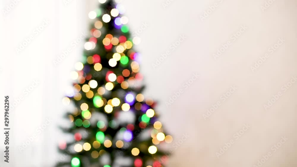 Merry Christmas! Christmas tree with toys and luminous garlands. Beautiful blurred background. Merry Christmas! Christmas tree with toys and luminous garlands. Beautiful blurred background.