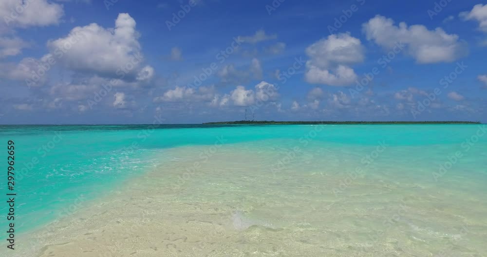Tropical water splashes and makes waves over a shallow underwater sandbar in the Caribbean Tropical water splashes and makes waves over a shallow underwater sandbar in the Caribbean