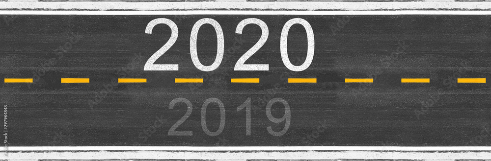 2019 to 2020 Happy New Year text with asphalt road with marking lines white stripes texture Background,During Christmas and New Year. 2019 to 2020 Happy New Year text with asphalt road with marking lines white stripes texture Background,During Christmas and New Year.