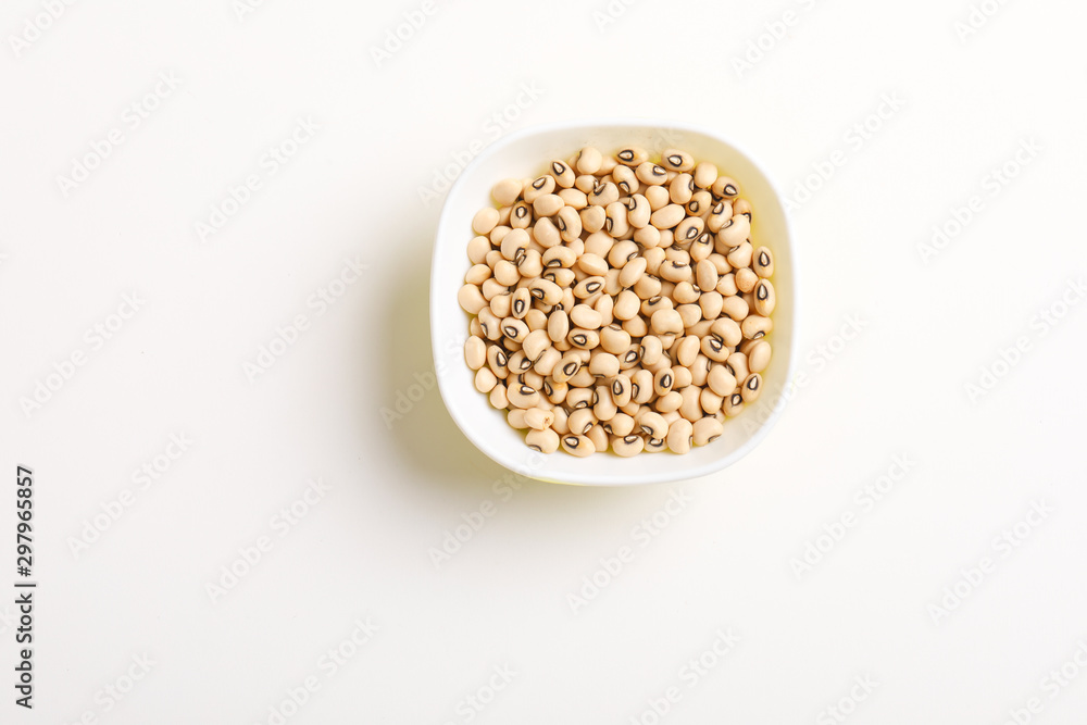Black eyed seeds or chawali seeds in glass bowl on white background Black eyed seeds or chawali seeds in glass bowl on white background