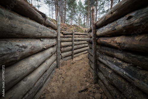 Wooden trench in the forest f World War II photo