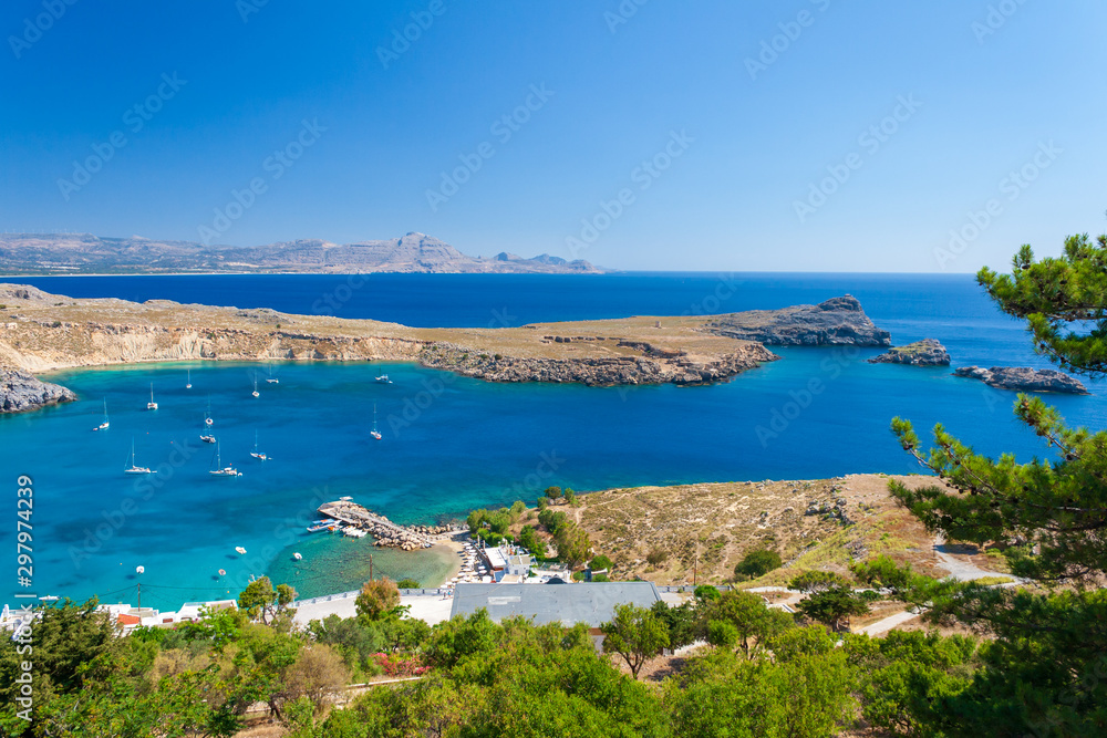 Sea ​​bay with boats near Lindos on the island of Rhodes