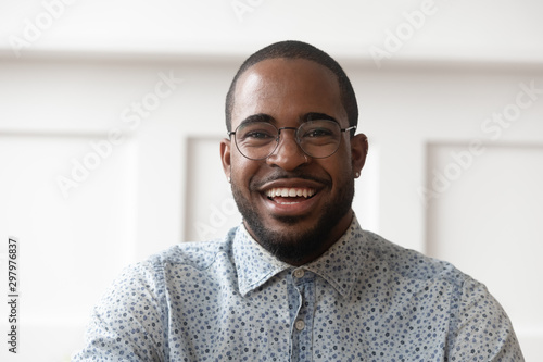 Portrait of smiling black man looking at camera