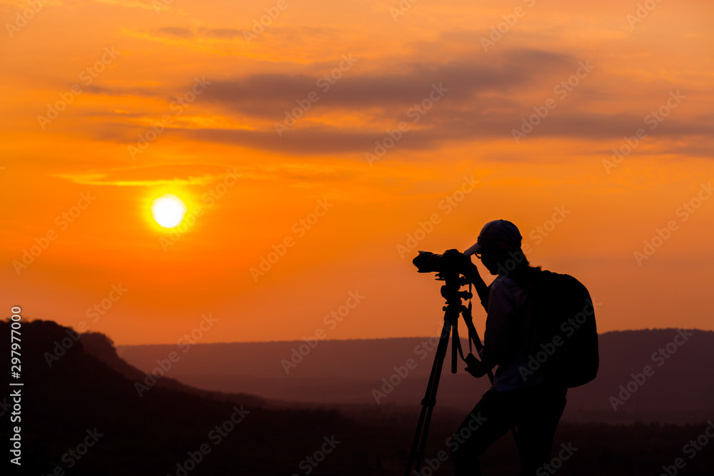 Picture silhouette of photographers shooting sunset , photography shooting sunset