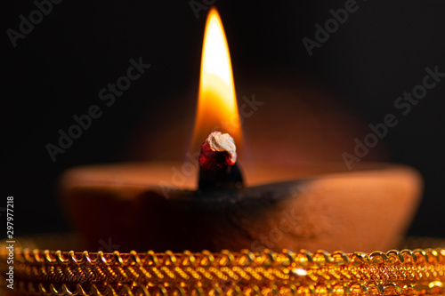 Happy diwali / karthigai deepam - Hindus religious festival - Candle flame close-up photo