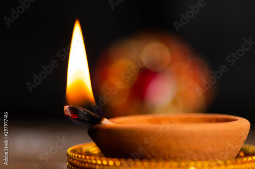Happy diwali / karthigai deepam - Hindus religious festival - Candle flame close-up