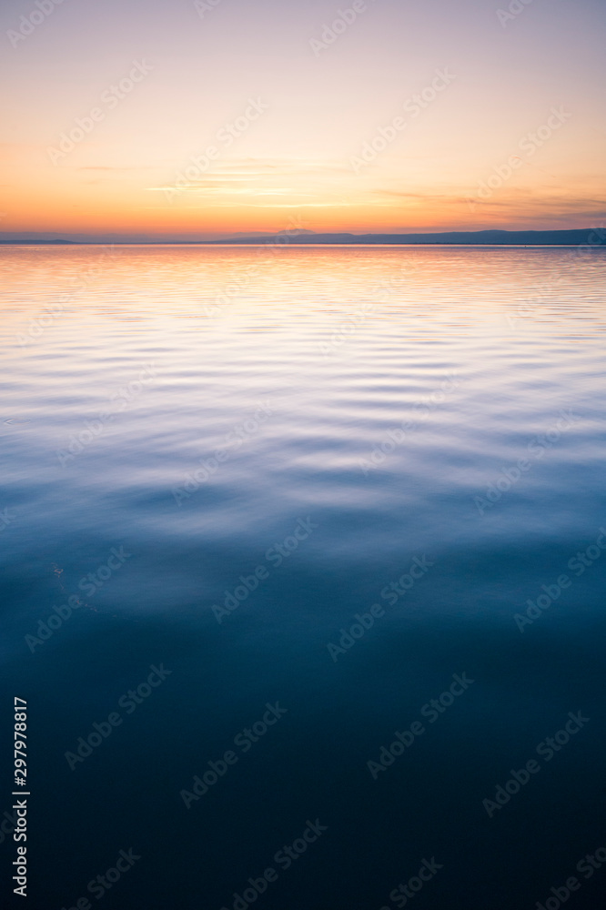 Obraz premium Sunset and soft light on lake neusiedl in Burgenland
