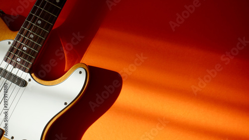 electric guitar closeup . color background