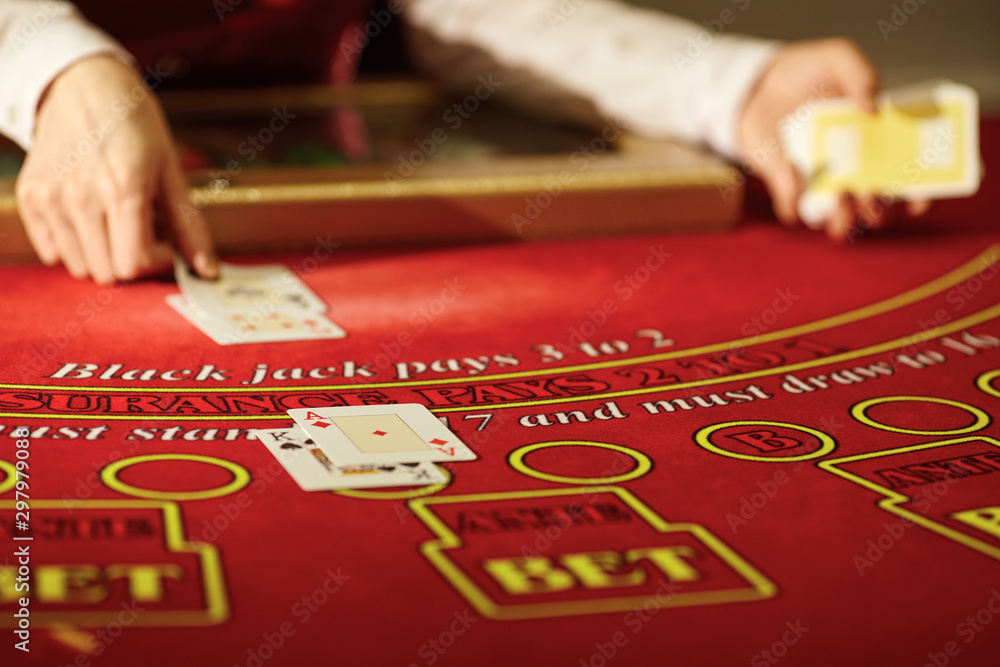 The croupier in the casino does a shuffle of cards The croupier in the casino does a shuffle of cards
