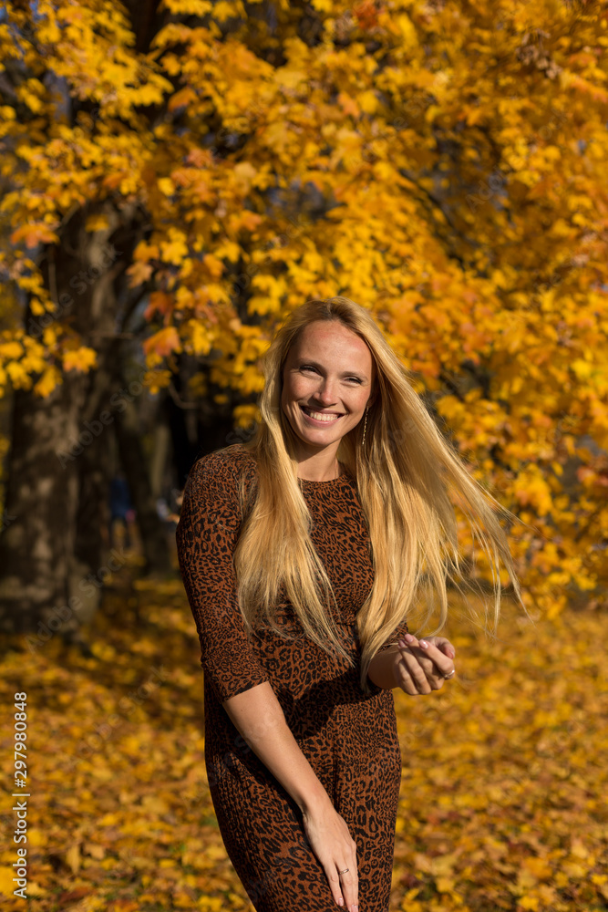Model at autumn in park Model at autumn in park