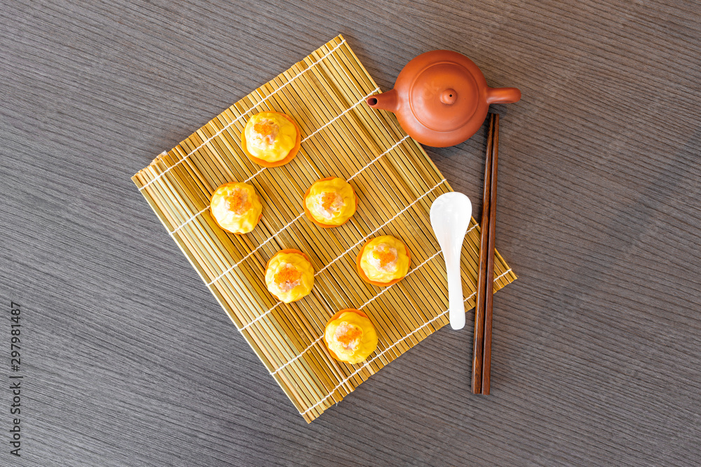 Cantonese Dim Sum, Siu Mai Shao Mai, teapot, white spoon and chopsticks ...