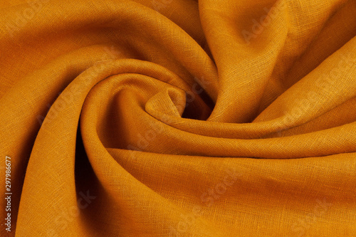 Orange fabric with folds background