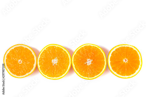 Four orange halves on a white isolated background.