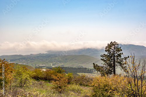 Crimea. Early spring. The mountains. Low cloud cover. Fog.