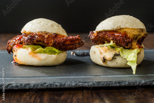 Gua Bao Burger with Crispy Chicken and Red Hot Chili Relish Sauce Buns. photo